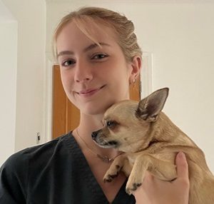 Former Derby College student Jorjia Jepson with her dog Boo.