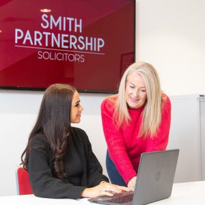 Former Derby College student Freya at work with her boss Claire Twells.